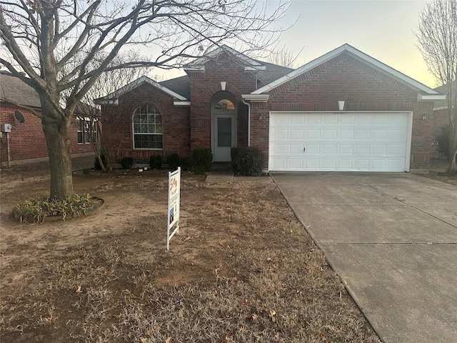 single story home with a garage