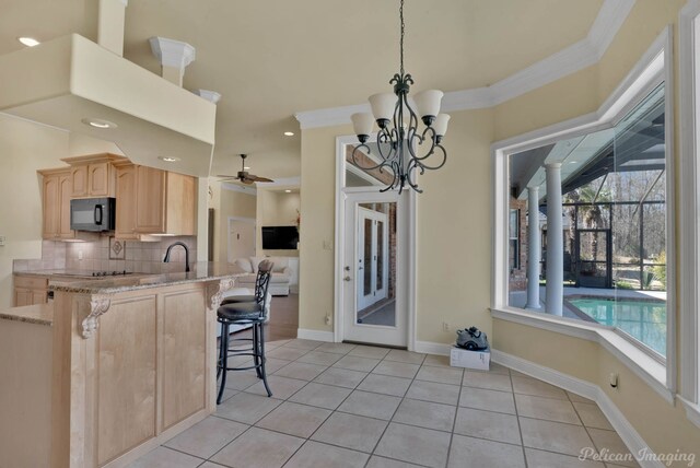 view of front of house with a garage and a yard