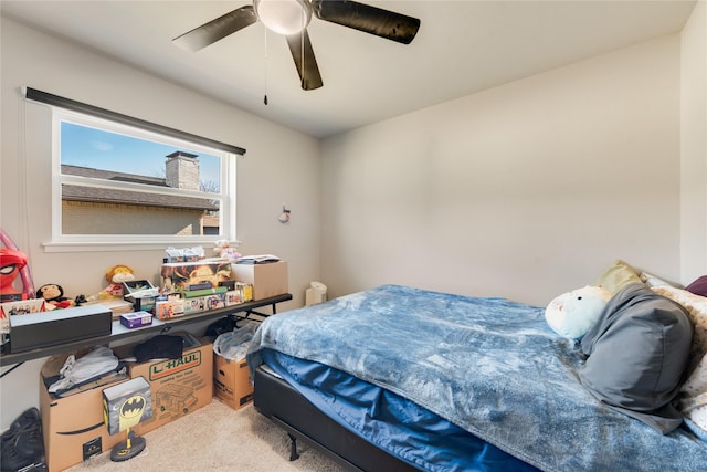 bedroom with ceiling fan and light colored carpet