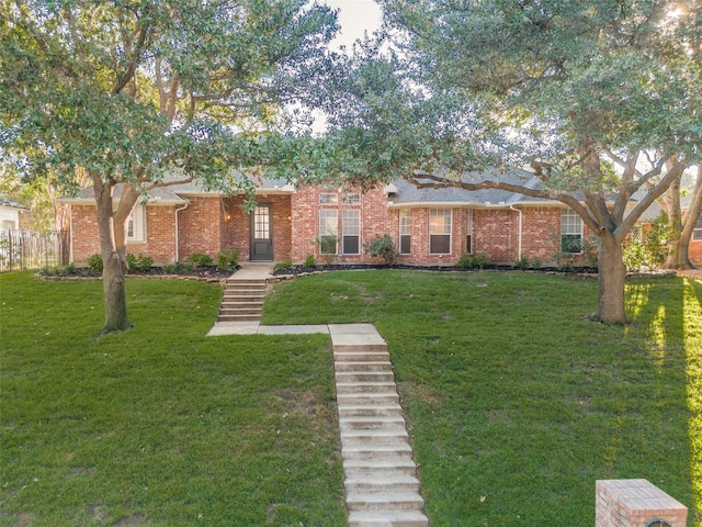 view of front of property with a front lawn