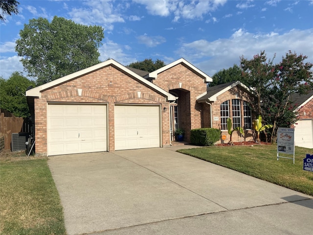 single story home featuring concrete driveway, cooling unit, an attached garage, brick siding, and a front lawn