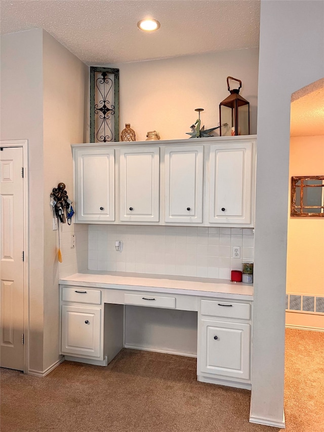 bathroom featuring hardwood / wood-style floors, a textured ceiling, plus walk in shower, vanity, and vaulted ceiling