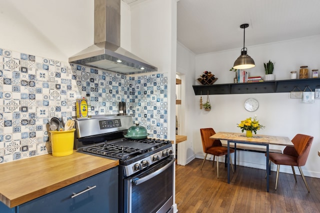 kitchen with decorative light fixtures, decorative backsplash, stainless steel gas range oven, blue cabinets, and island range hood