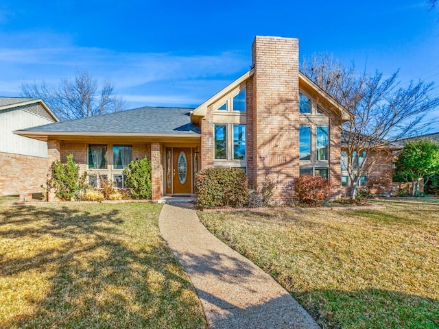 view of front of home with a front lawn