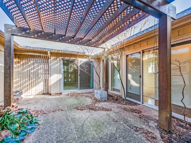 view of patio featuring a pergola