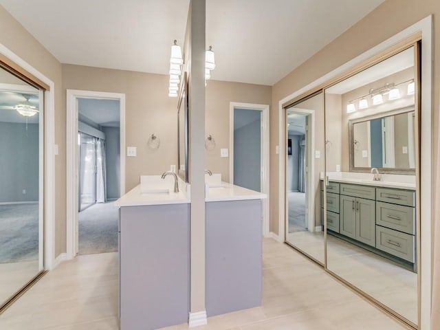 bathroom featuring a healthy amount of sunlight and vanity