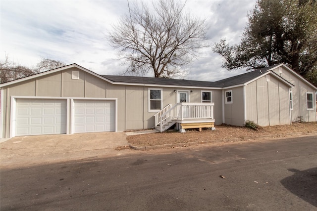 ranch-style home with a garage