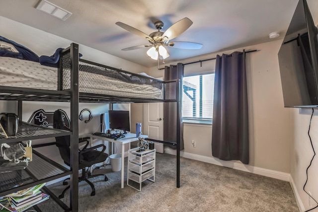 bedroom with ceiling fan and carpet