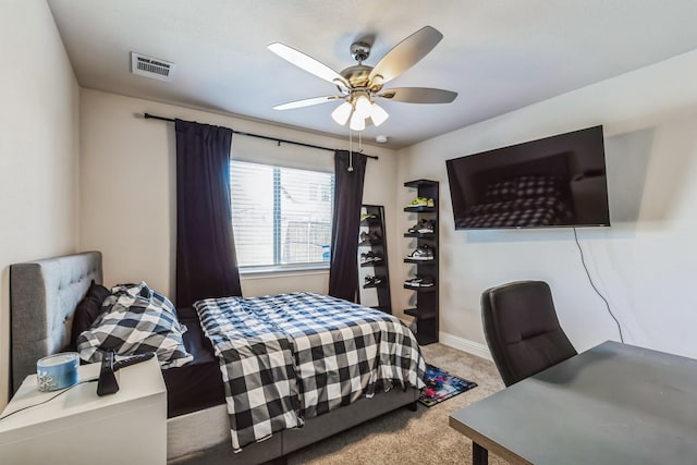 bedroom with ceiling fan and carpet