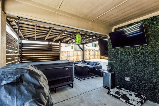 view of patio with a hot tub