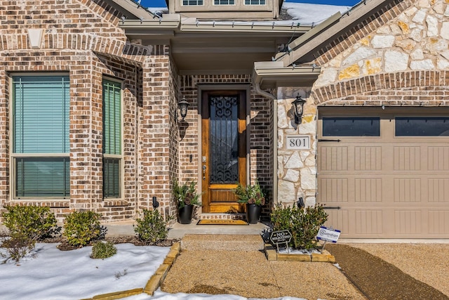 entrance to property featuring a garage