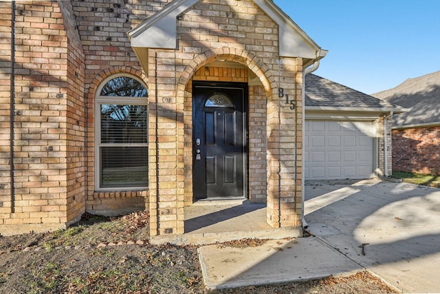 entrance to property with a garage