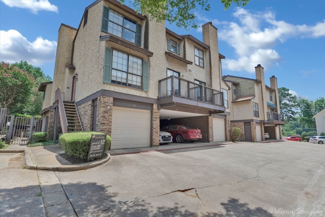 view of property exterior with a garage