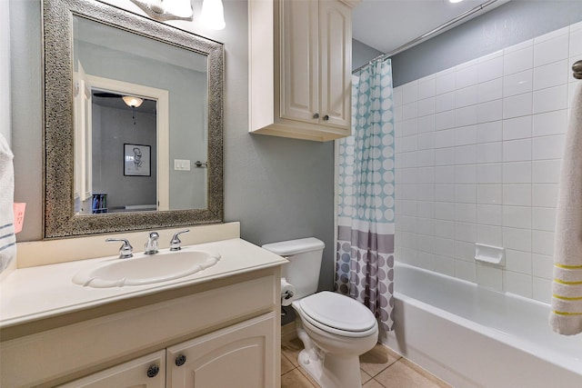 full bathroom with tile patterned floors, toilet, shower / tub combo, and vanity