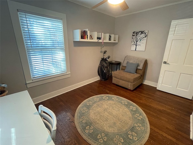 sitting room featuring ceiling fan, dark hardwood / wood-style flooring, and crown molding