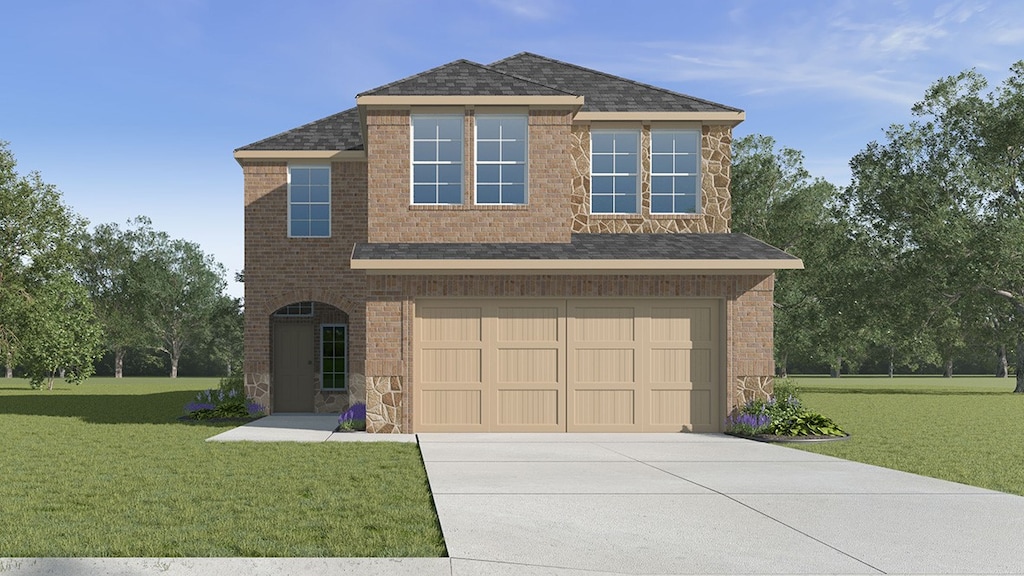 view of front of house with a garage and a front yard