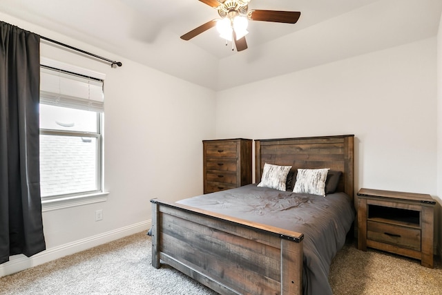 bedroom featuring ceiling fan and light colored carpet