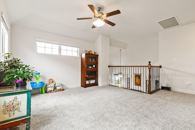 recreation room featuring ceiling fan and carpet flooring