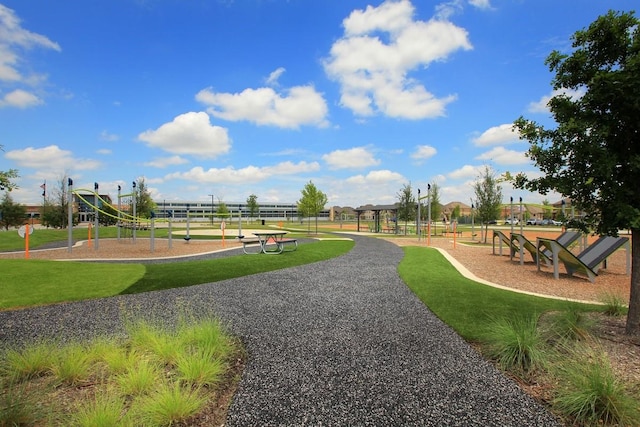 view of playground with a yard