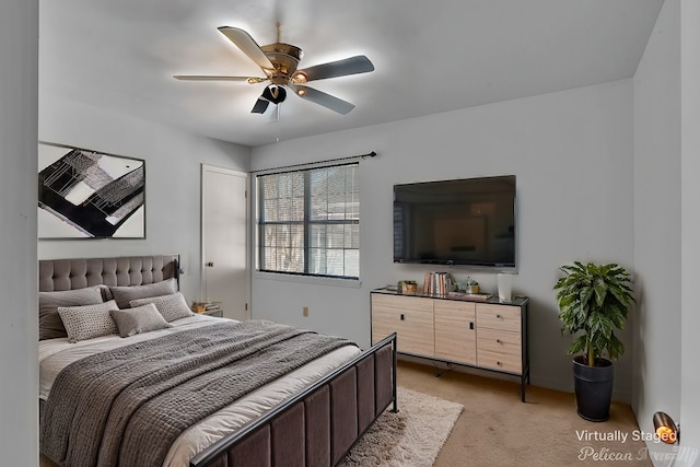 bedroom featuring ceiling fan and light colored carpet