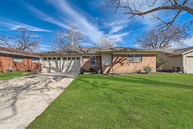 ranch-style home featuring a front yard and a garage