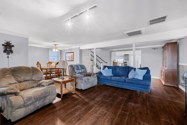 living room with rail lighting, a textured ceiling, and ceiling fan