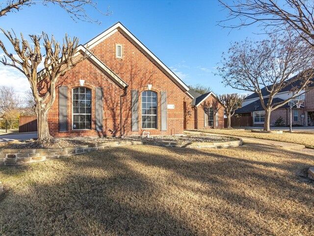 view of side of home featuring a garage