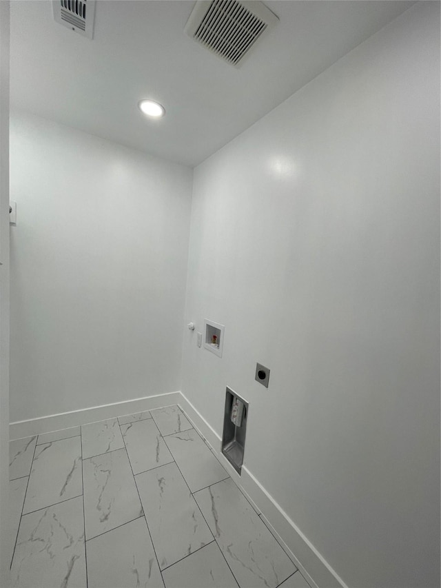 washroom with washer hookup and hookup for an electric dryer