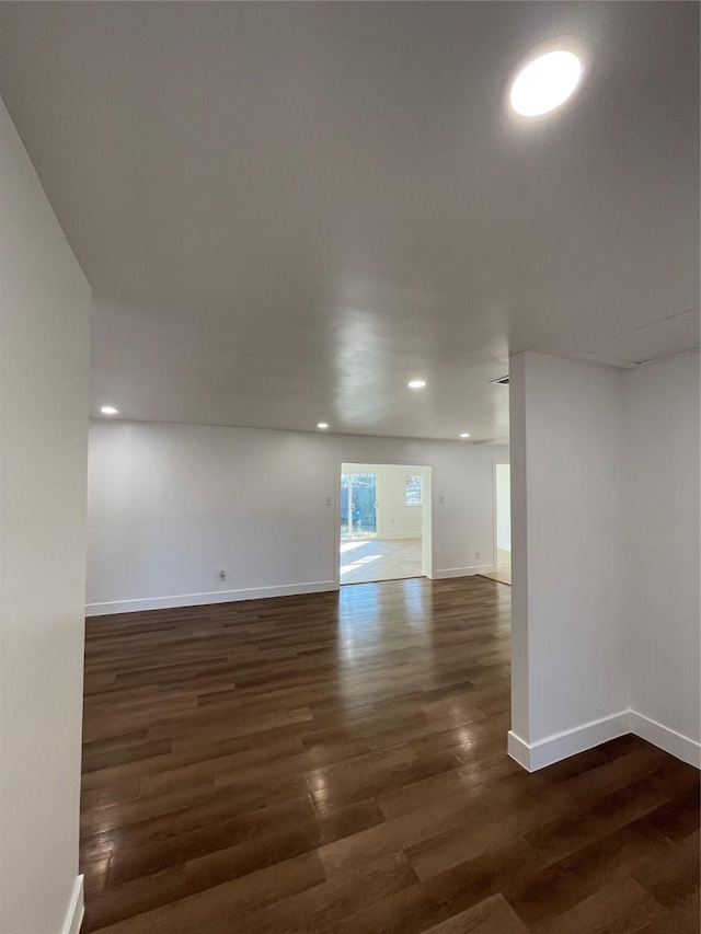 empty room featuring dark hardwood / wood-style floors