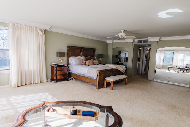 bedroom with ceiling fan, carpet flooring, and crown molding