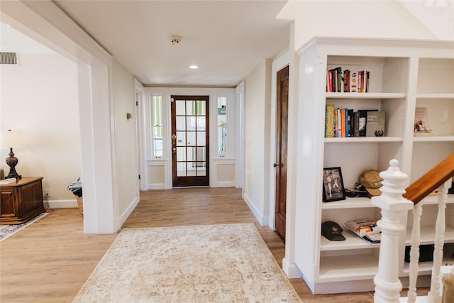 entrance foyer with light wood-type flooring