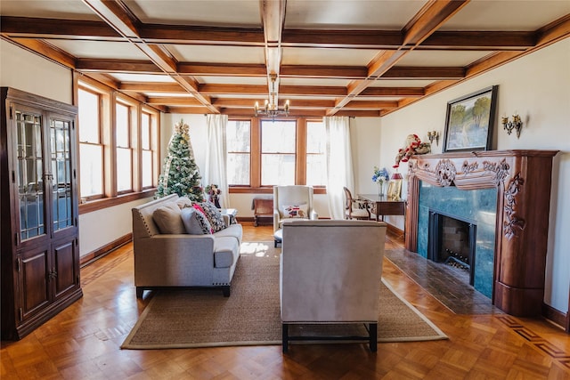 living room with a notable chandelier, parquet floors, coffered ceiling, and beamed ceiling