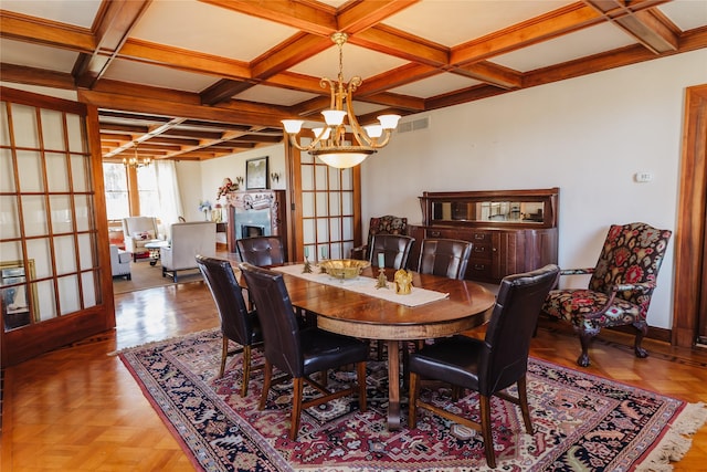 dining room with beamed ceiling, coffered ceiling, french doors, parquet floors, and a chandelier