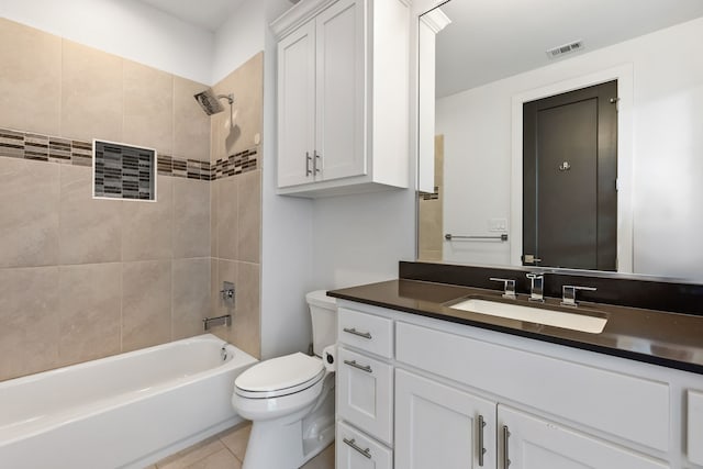 bathroom with vanity, visible vents, bathtub / shower combination, tile patterned floors, and toilet