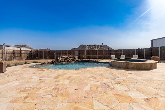 view of pool featuring a fenced in pool, a patio, an in ground hot tub, and a fenced backyard