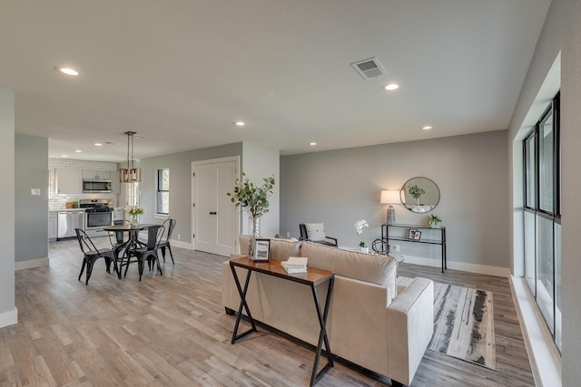 living room featuring light hardwood / wood-style floors