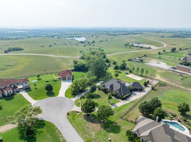 birds eye view of property featuring a rural view