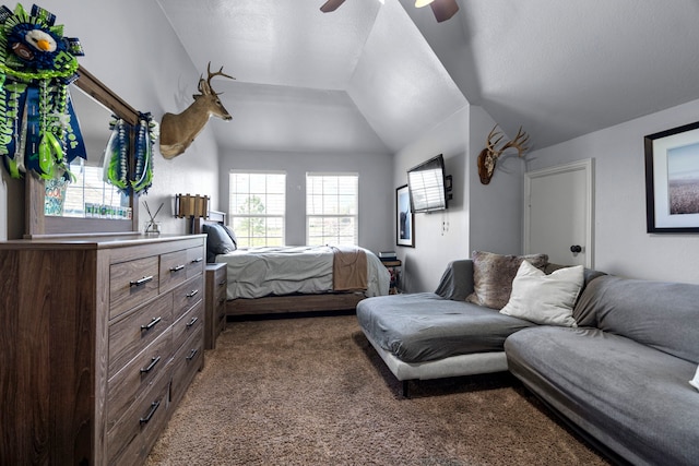 bedroom with multiple windows, vaulted ceiling, carpet flooring, and ceiling fan