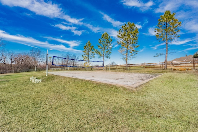 view of property's community with a yard, a rural view, and volleyball court