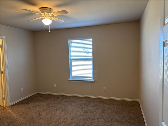 carpeted empty room with ceiling fan