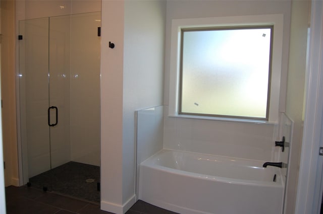 bathroom featuring tile patterned floors and plus walk in shower