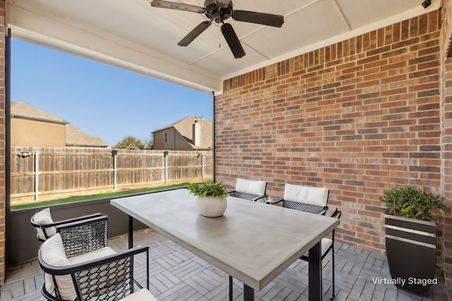 rear view of house with a lawn, a patio, and ceiling fan