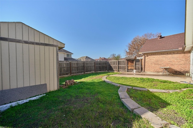 view of yard with a patio area