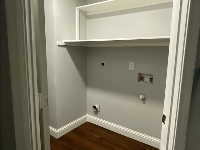 laundry area featuring washer hookup, hookup for a gas dryer, dark hardwood / wood-style floors, and electric dryer hookup