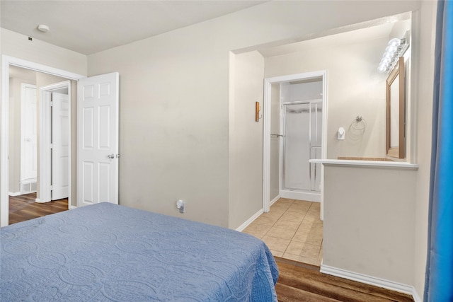 bedroom with a closet and wood-type flooring