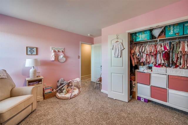 interior space featuring a closet and carpet flooring