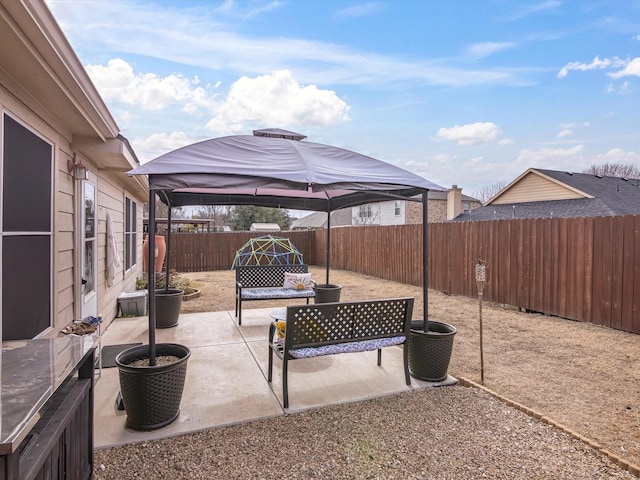 view of patio featuring a gazebo and outdoor lounge area