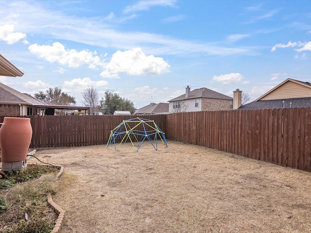 view of yard with a playground