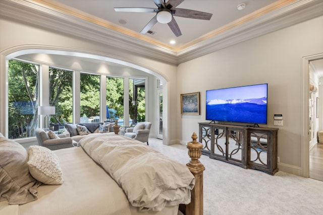 carpeted bedroom with ceiling fan and crown molding