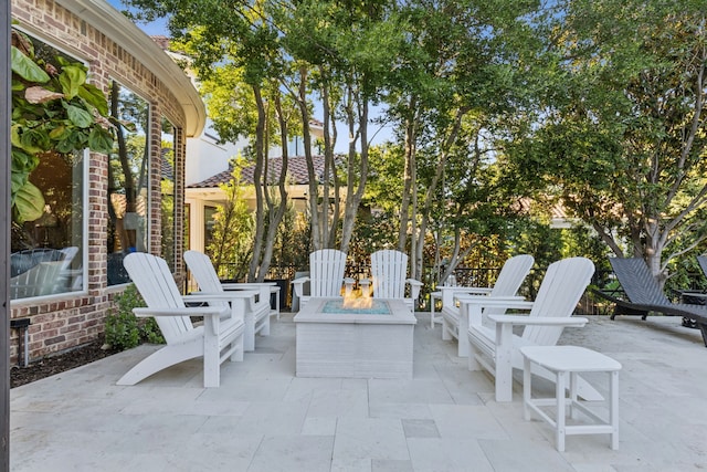 view of patio / terrace with an outdoor fire pit